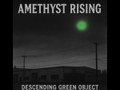 DESCENDING GREEN OBJECT